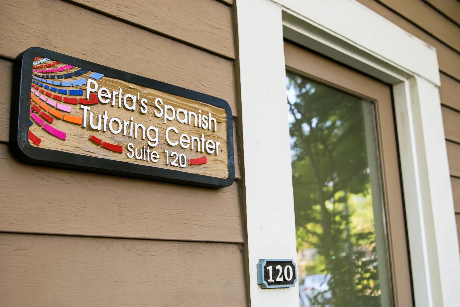 Perla Spanish Tutoring Center entrance at Suite 120